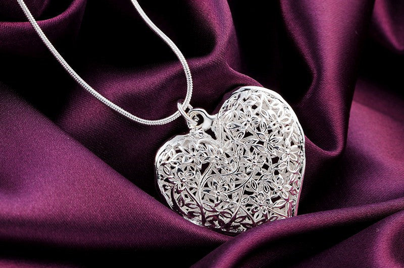 Elegance Carved Silver Necklace