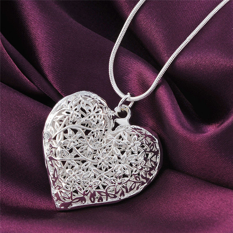 Elegance Carved Silver Necklace