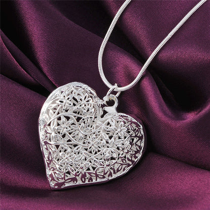 Elegance Carved Silver Necklace