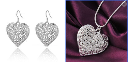 Elegance Carved Silver Necklace